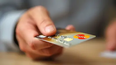 How to Use a Secured Credit Card to Boost Your FICO Score